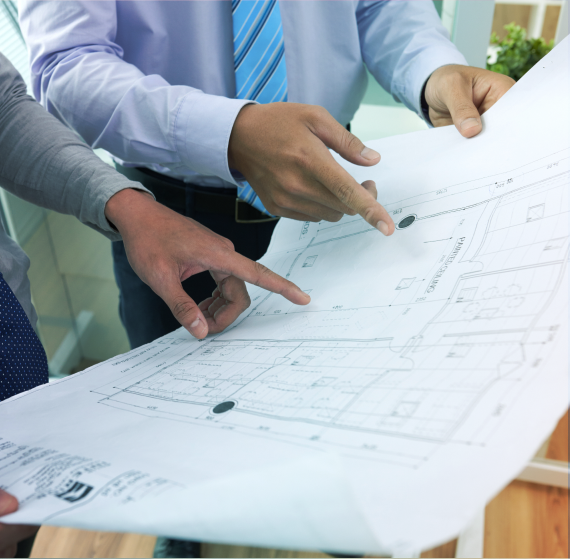 Architects discussing a construction blueprint